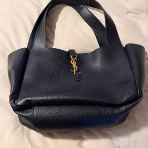 Elegant Black Leather Shoulder Bag with Gold Accent